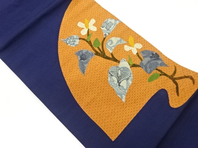 手織り紬切り嵌めパッチワーク枝に花葉模様名古屋帯